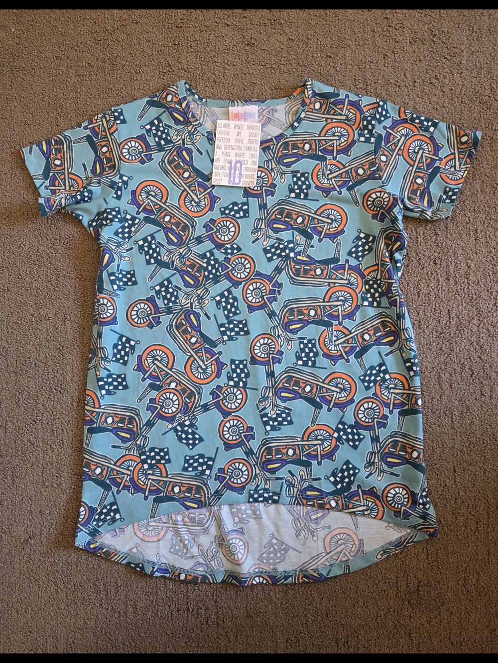 LuLaRoe Teal Scooter Print Top with Orange and Purple Accents